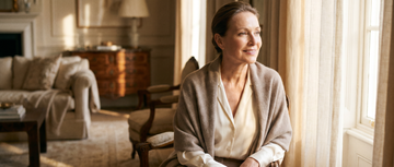 Graceful woman with radiant firm skin in warm light